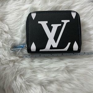 Branded black and white wallet